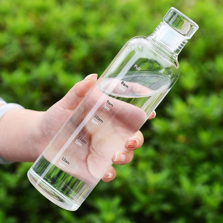 زجاجة زجاج ملوّنة – سعة 1 لتر | شكل أنيق ومناسب للتقديم أو الاستخدام اليومي 💧