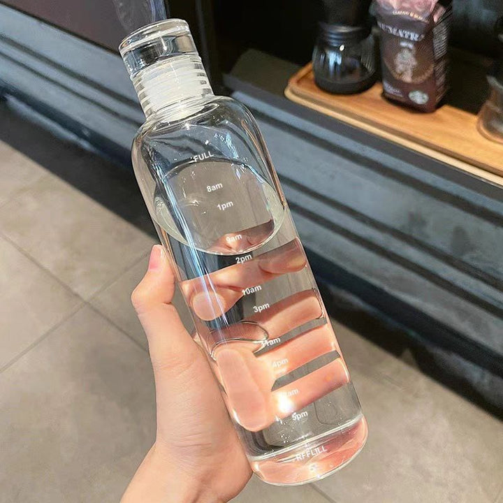 زجاجة زجاج ملوّنة – سعة 1 لتر | شكل أنيق ومناسب للتقديم أو الاستخدام اليومي 💧